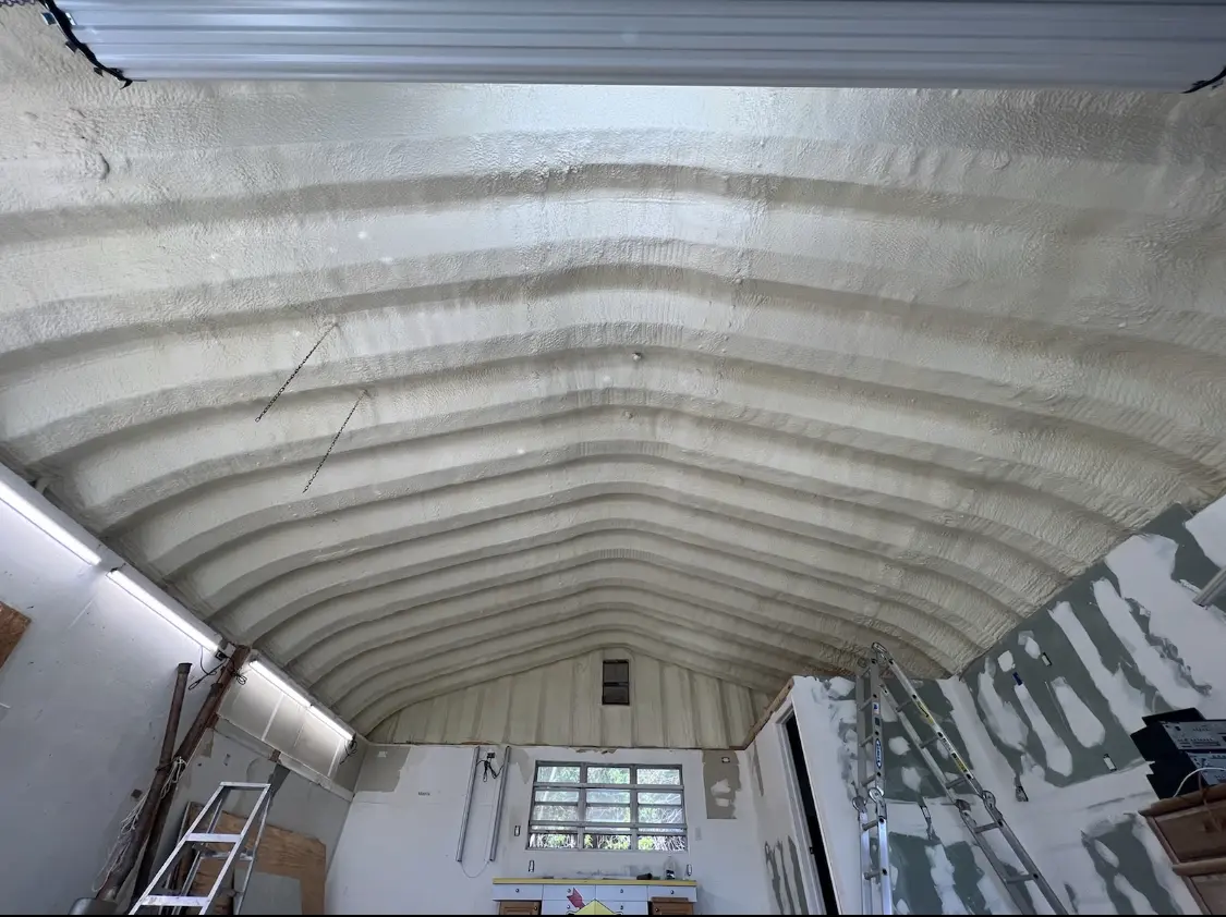 Spray polyurethane foam applied to the underside of a metal roof deck in Joshua Tree